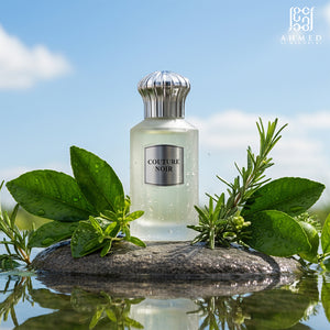 Couture Noir perfume bottle with herbs